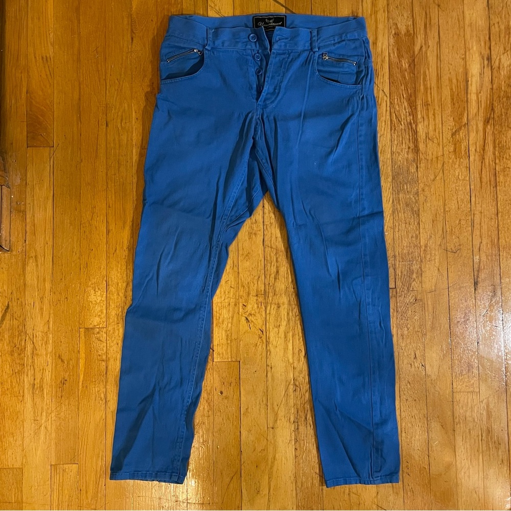 Unconditional blue pants with zipper details